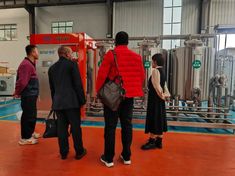 INTOP Berjaya Menubuhkan Barisan Pengeluaran Minuman Air Tulen di Tanzania